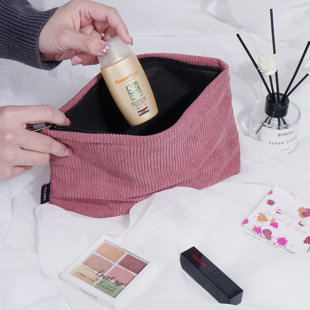 Corduroy Cosmetic Bag - Soft Travel Case A soft corduroy cosmetic bag with a stylish look and roomy interior. Ideal for storing makeup, brushes, and small skincare items. Lightweight, durable, and easy to carry for travel or daily use.