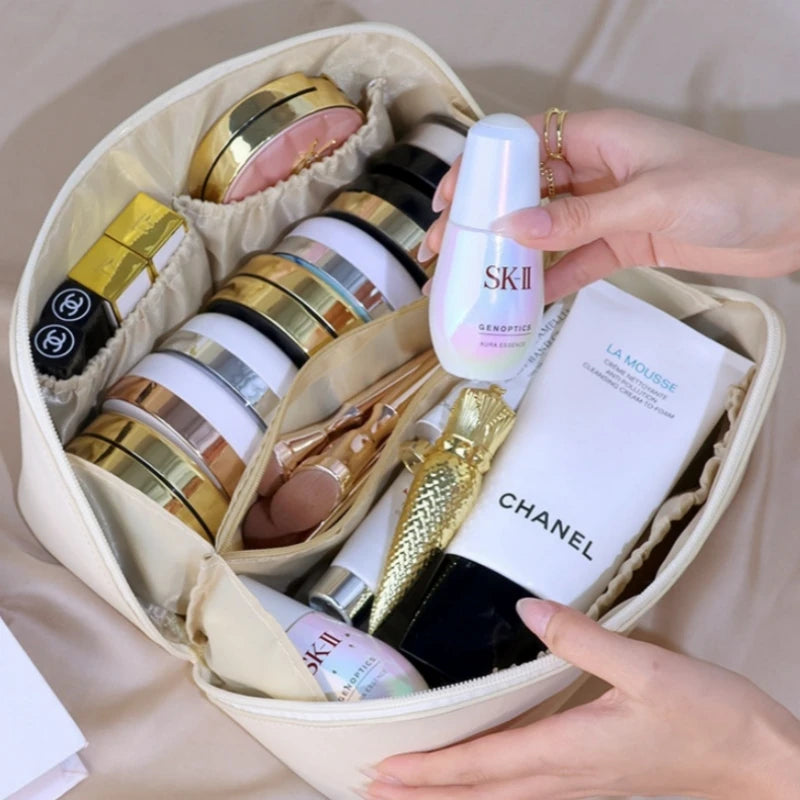 Luxury Makeup & Skincare Travel Bag - A spacious travel bag designed to hold makeup and skincare products securely. Structured design keeps items organized and protected. Perfect for trips, vacations, or everyday organization.