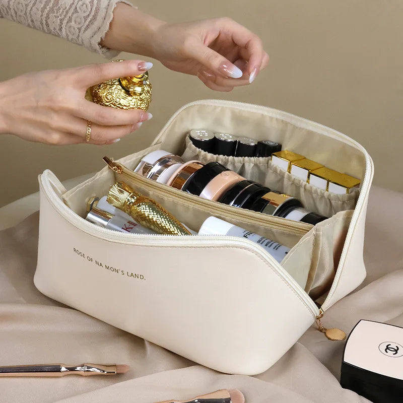 Luxury Makeup & Skincare Travel Bag - A spacious travel bag designed to hold makeup and skincare products securely. Structured design keeps items organized and protected. Perfect for trips, vacations, or everyday organization.