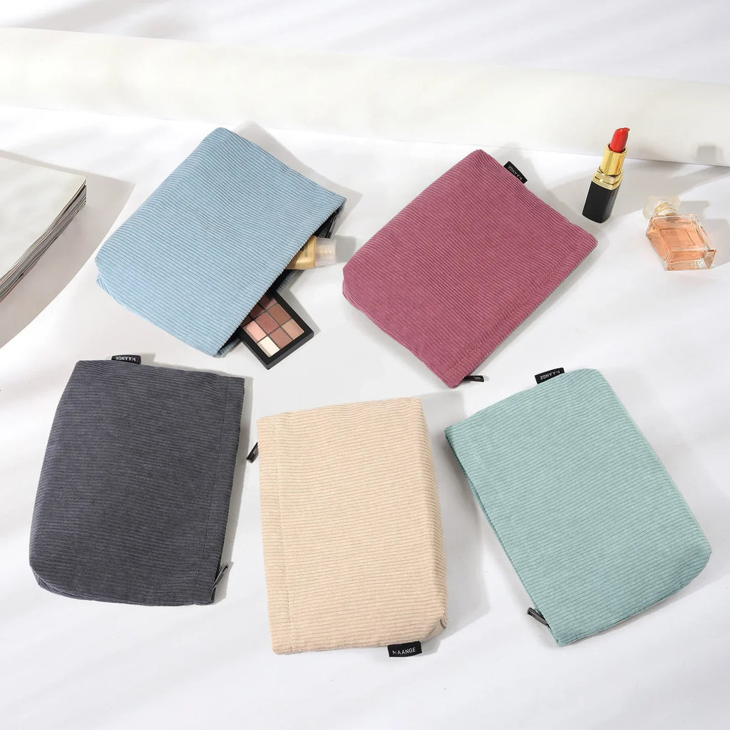Corduroy Cosmetic Bag - Soft Travel Case A soft corduroy cosmetic bag with a stylish look and roomy interior. Ideal for storing makeup, brushes, and small skincare items. Lightweight, durable, and easy to carry for travel or daily use.