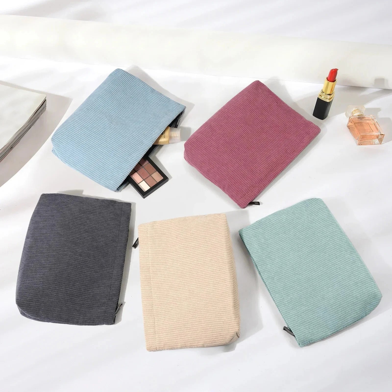 Corduroy Cosmetic Bag - Soft Travel Case A soft corduroy cosmetic bag with a stylish look and roomy interior. Ideal for storing makeup, brushes, and small skincare items. Lightweight, durable, and easy to carry for travel or daily use.